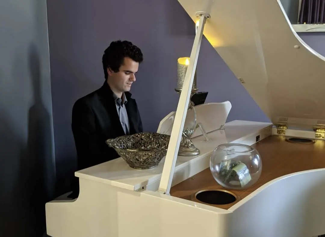 Piano performance at Fleur de Lis restaurant